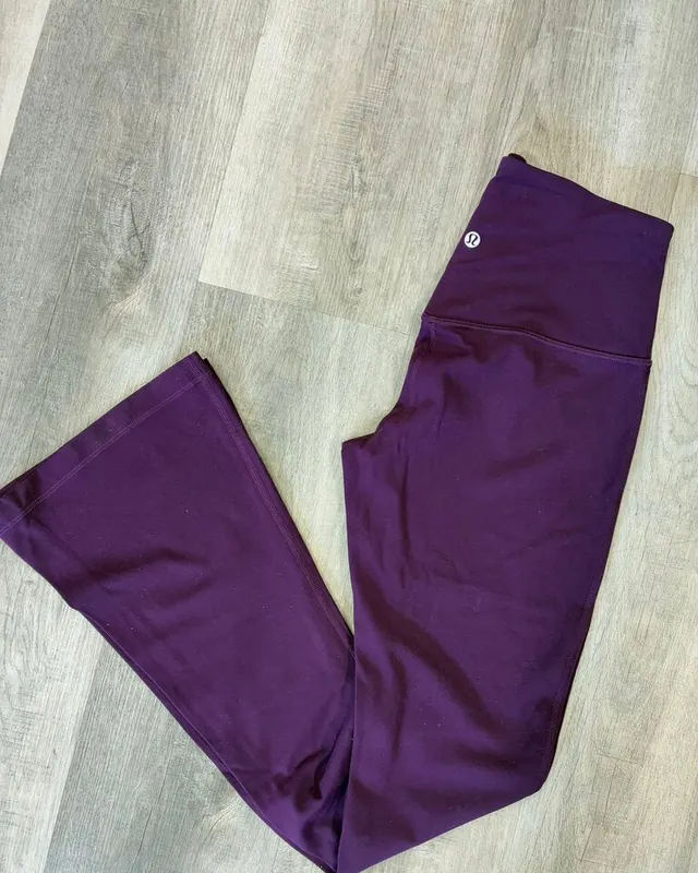 Purple Lululemon bell bottom athletic pants